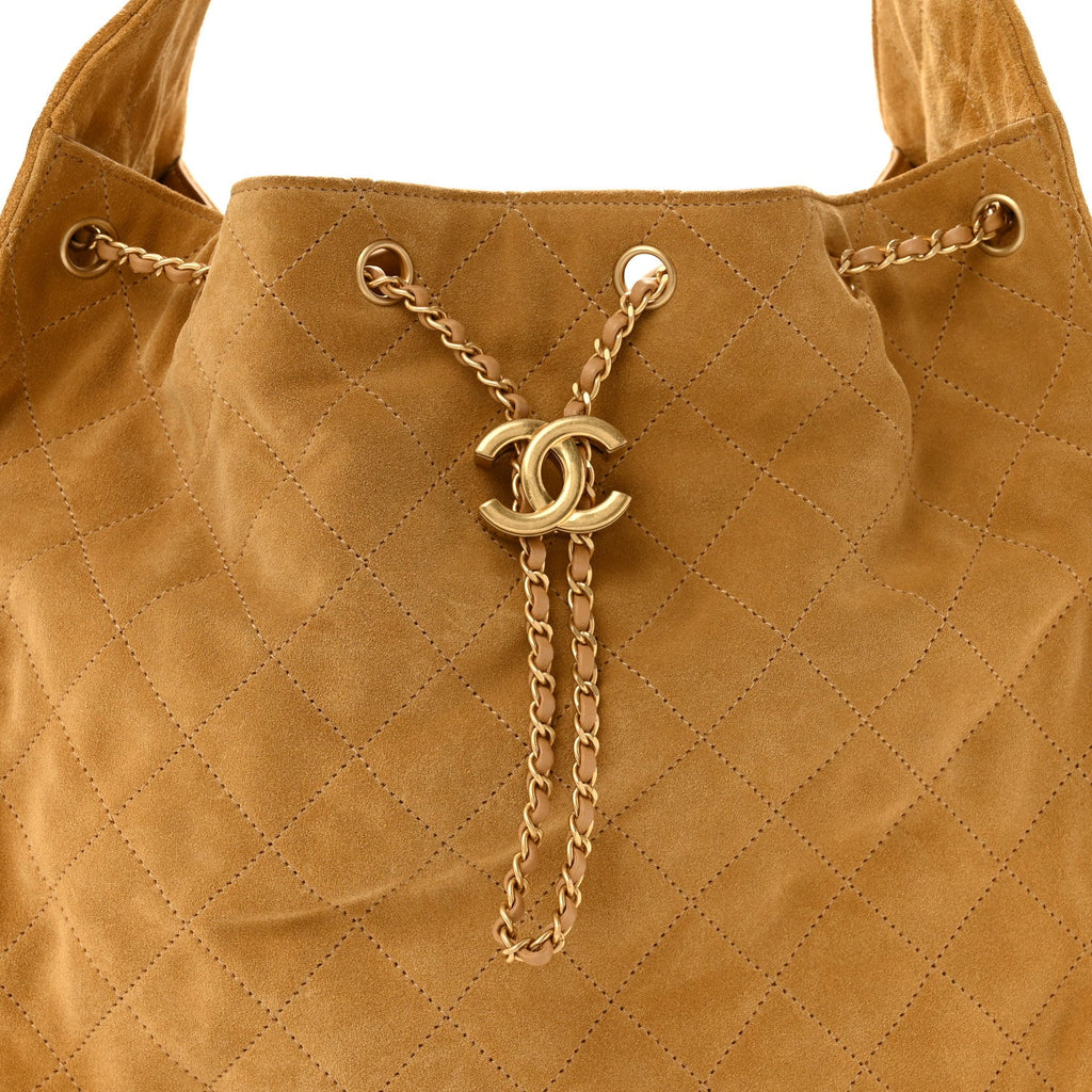 Suede Quilted Medium Chanel 25 Handbag Beige