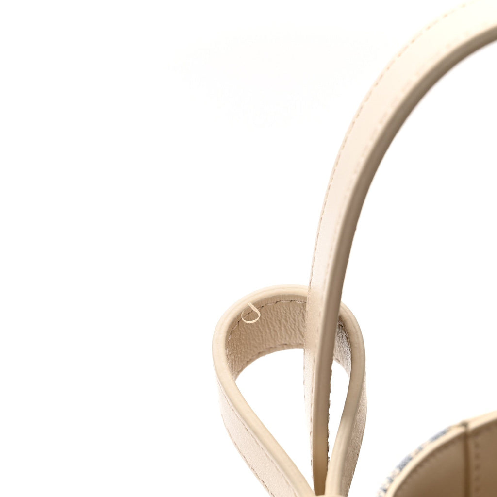 Oblique Calfskin Medium Signature Bucket Bag Beige