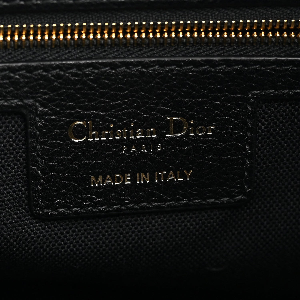 Grained Calfskin Flat Macrocannage Medium Voyage Bag Black