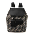 Oblique Jacquard Grained Calfskin Drawstring Saddle Backpack Beige Black